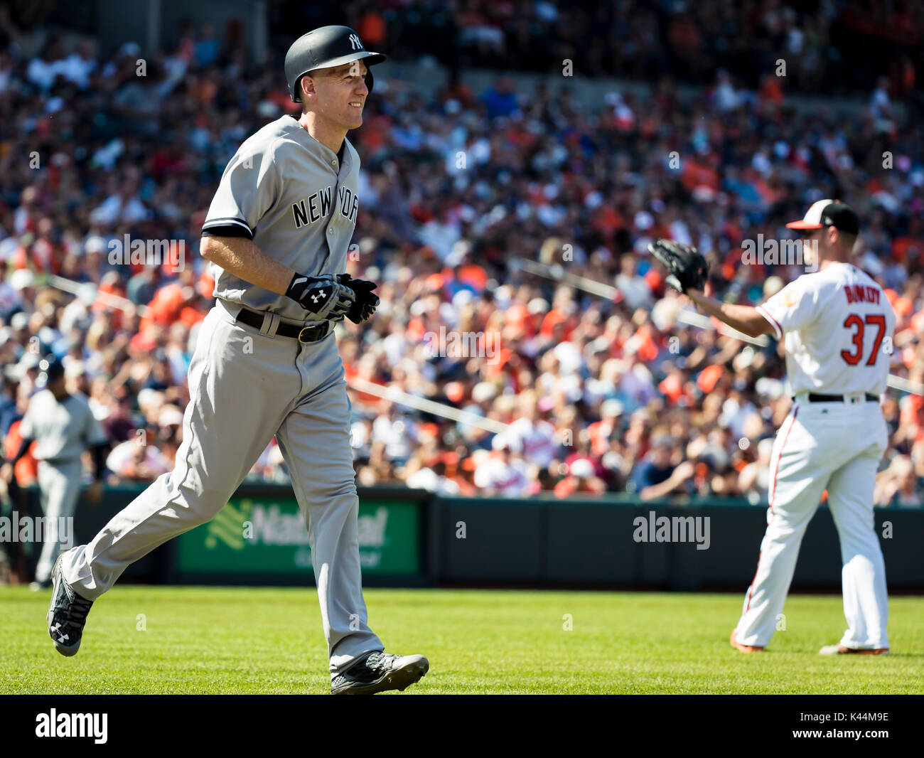 Baltimore, Maryland, USA. 04th Sep, 2017. New York Yankees third baseman Todd Frazier (29) is walked by Baltimore Orioles starting pitcher Dylan Bundy (37) during MLB game between New York Yankees and Baltimore Orioles at Oriole Park at Camden Yards in Baltimore, Maryland. Scott Taetsch/CSM/Alamy Live News Stock Photo