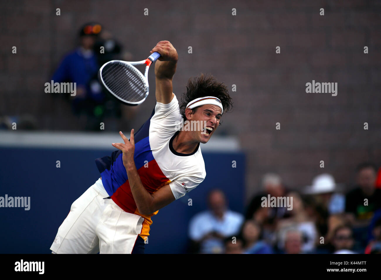 Flushing Meadows, New York, USA. 4th Sep, 2017. US Open Tennis: number 6 seeded Dominic Thiem of Austria serves during his fourth round match against Juan Martin del Potro of Argentina at the US Open in Flushing Meadows, New York. del Potro won the match in five sets to advance to the quarterfinals. Credit: Adam Stoltman/Alamy Live News Stock Photo