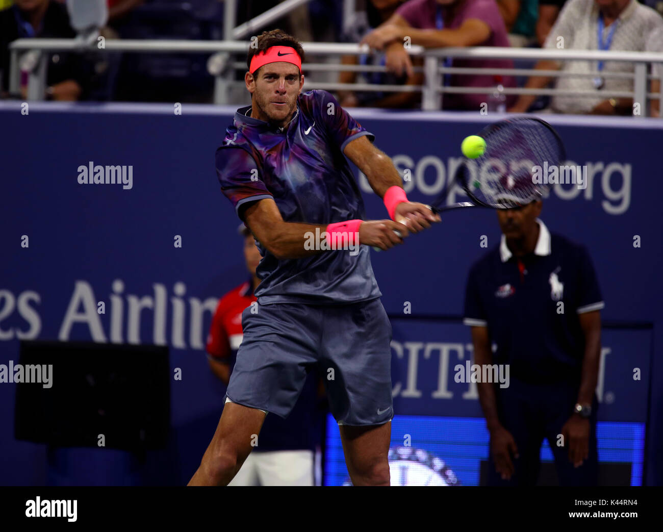 New York, United States. 04th Sep, 2017. US Open Tennis: New York, 4 September, 2017 - Juan Martin del Potro strikes a backhand to number 6 seeded Dominic Thiem of Austria in fourth round match at the US Open in Flushing Meadows, New York. del Potro won the match in five sets to advance to the quarterfinals. Credit: Adam Stoltman/Alamy Live News Stock Photo