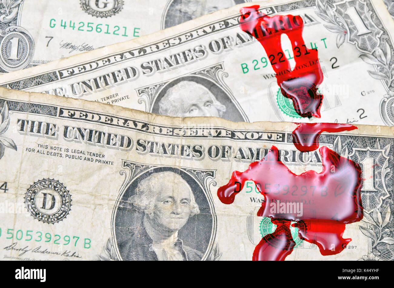 Dollar bill with blood drops Stock Photo