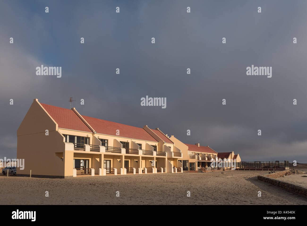 CAPE CROSS, NAMIBIA - JUNE 28, 2017: Part of the lodge at Cape Cross at sunset in the Dorob National Park of Namibia Stock Photo