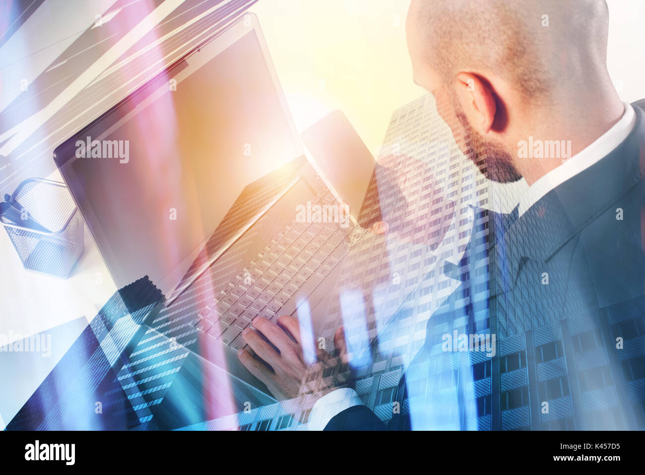 Businessperson in office connected on internet network with laptop Stock Photo