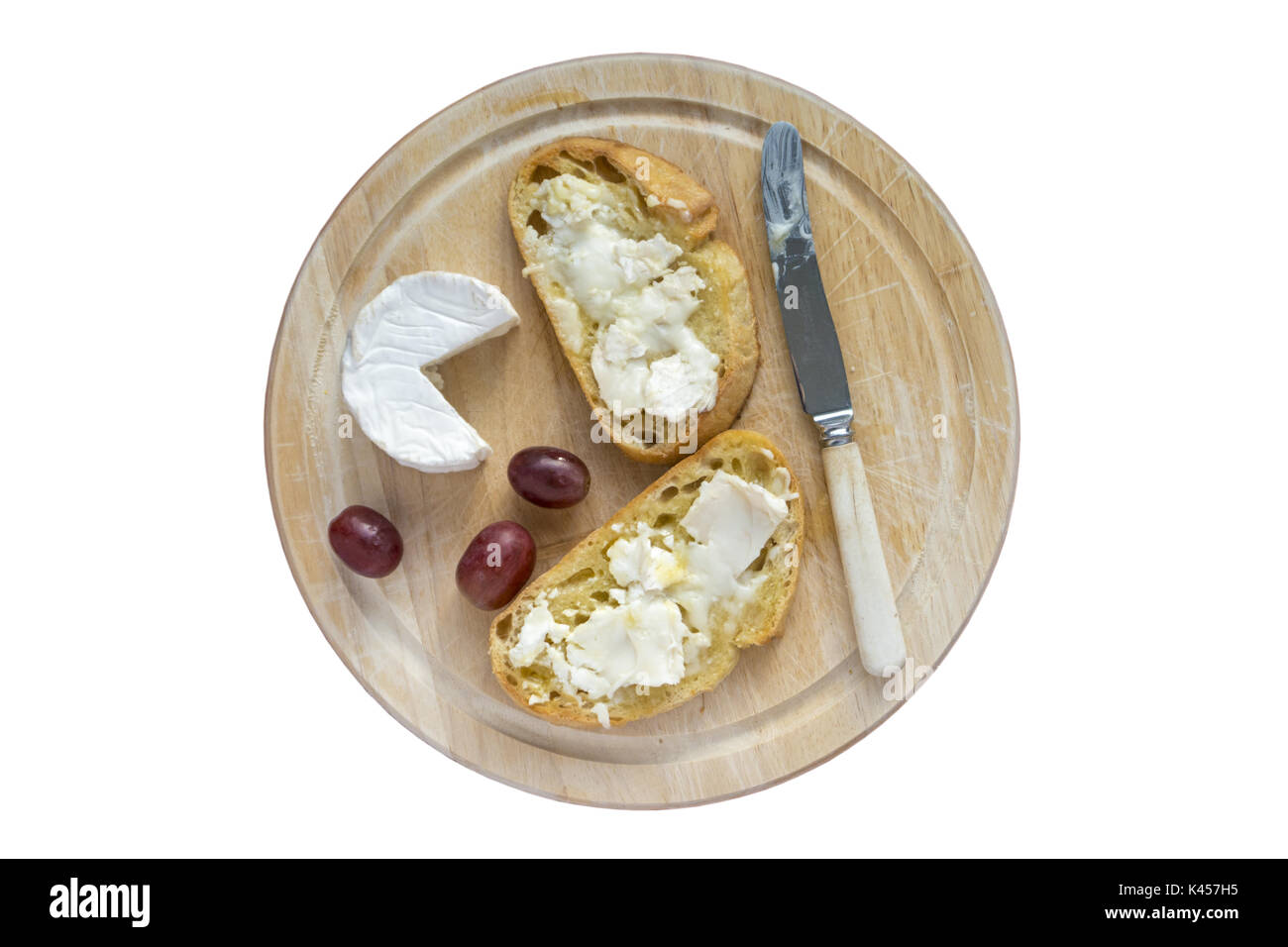 Toasted Sourdough and Goats Cheese on a bread board Stock Photo Alamy