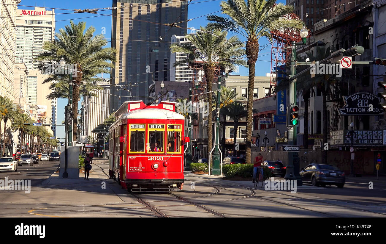 Red streetcar on Canal Street in downtown New Orleans, Louisiana Stock Photo