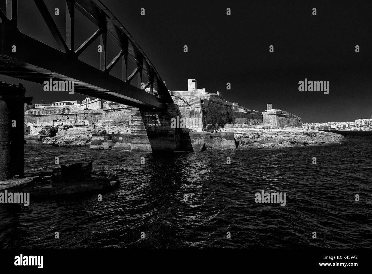 Black and white photograph of Fort St Elmo, Valletta, Malta, from entrance to Grand Harbour Stock Photo