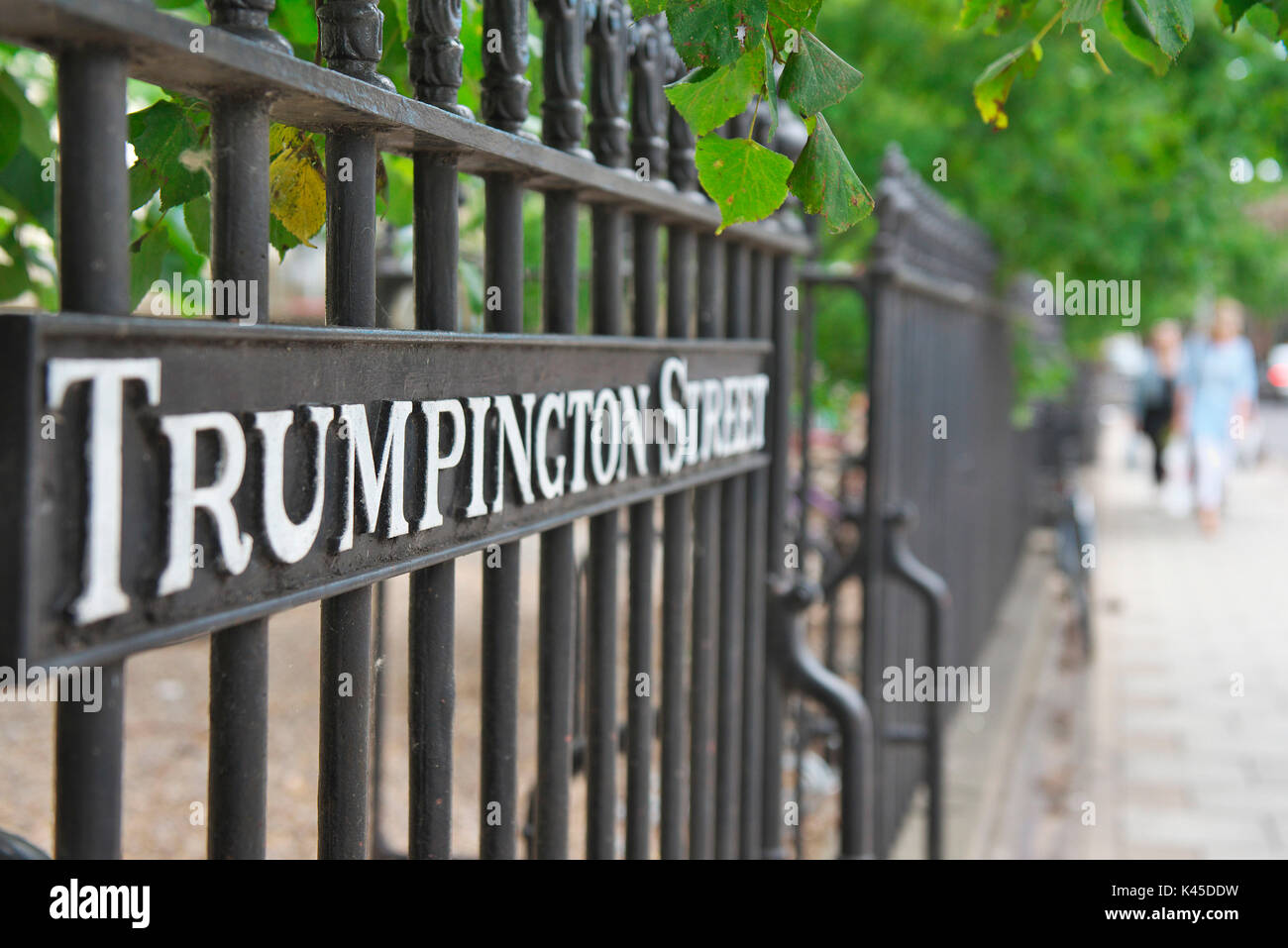 Trumpington Street sign in Cambridge city centre along the black railings Stock Photo