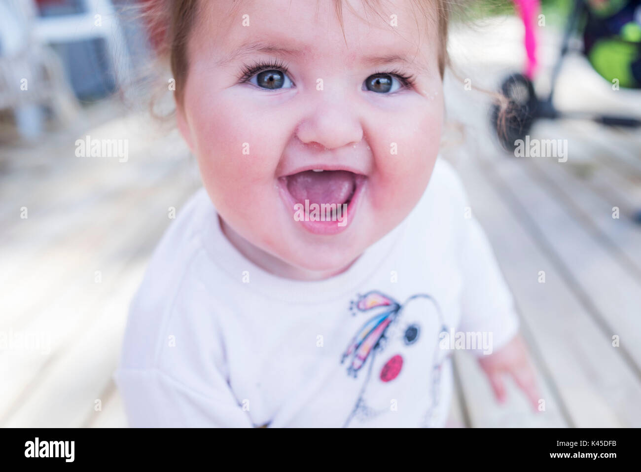 happy healthy baby smiling eyes to camera Finland Stock Photo