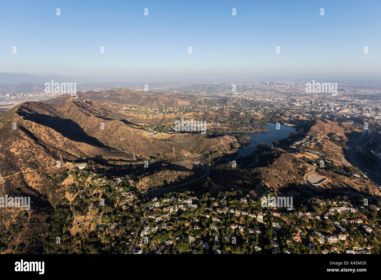 Aerial view of Mt. Lee, Mt. Hollywood, Griffith Park and hillside homes in Los Angeles, California. Stock Photo