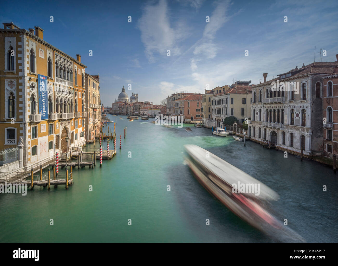 Accademia Bridge, Venice, Italy. Boats on Canal Grande Stock Photo