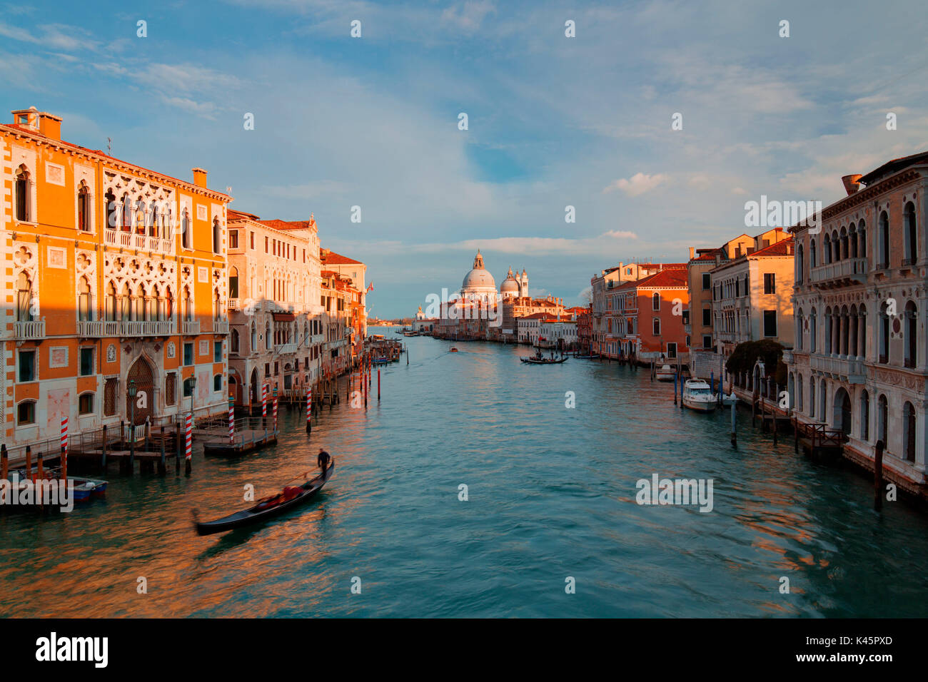 Europe, Italy, Veneto, Venice Gondola in the Grand Canal at sunset ...