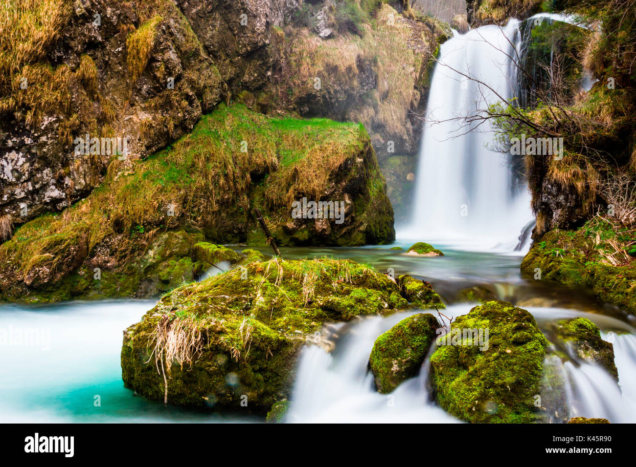 Waterfall, Municipality of Lastebasse, Province of Vicenza, Veneto, Italy. Cascading water over rocks. Stock Photo