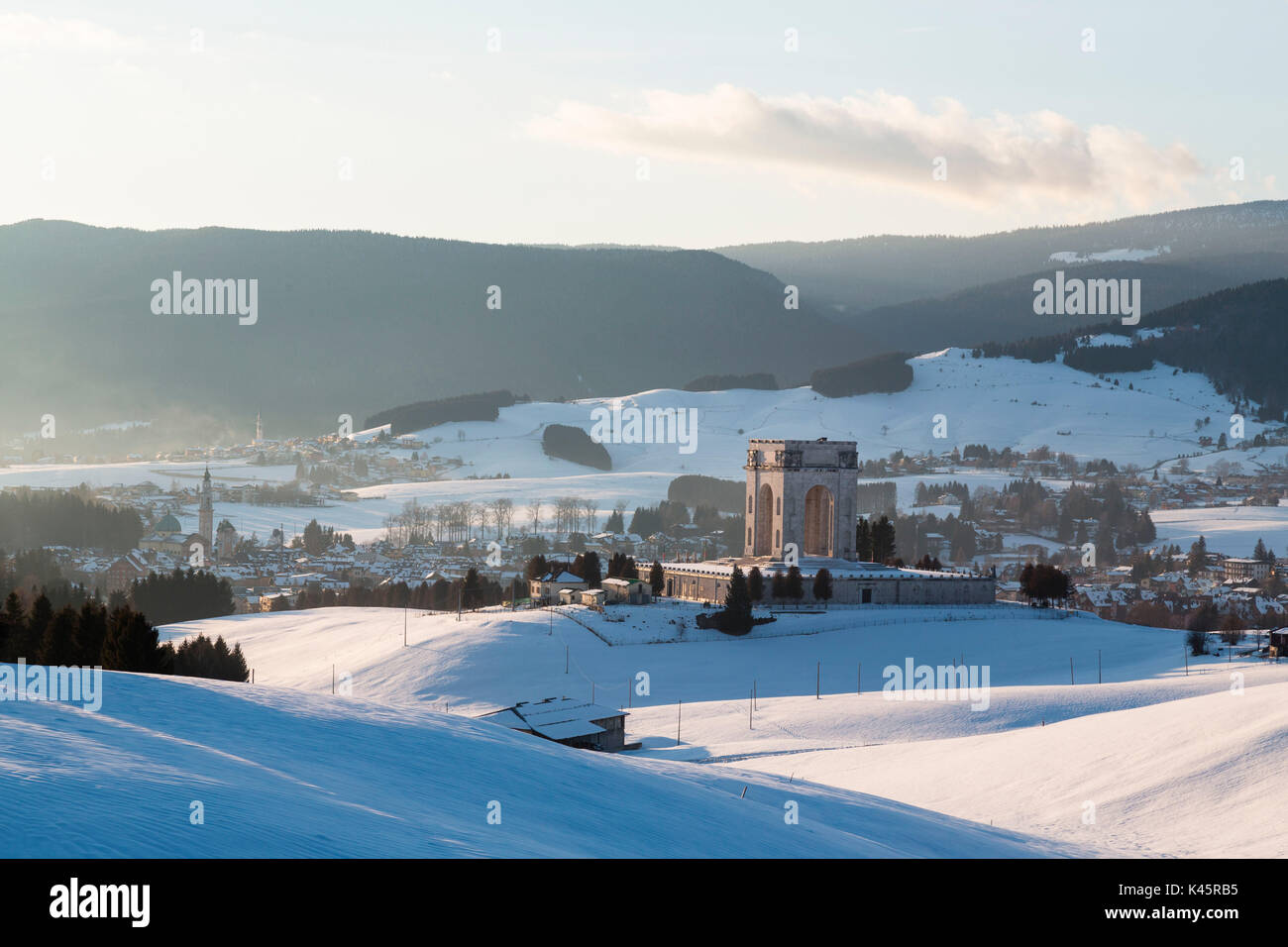 Monument, Altopiano of Asiago, Province of Vicenza, Veneto, Italy. War memorial in winter landscape. Stock Photo