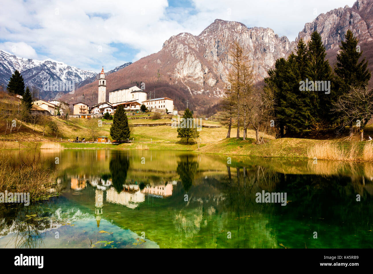 Laghi, Province of Vicenza, Veneto, Italy. Small Church above alpine lake. Stock Photo