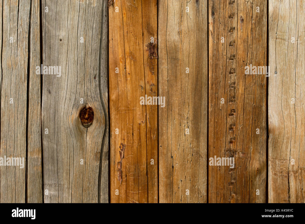 Time patina on the surface of the log on window shutter Stock Photo