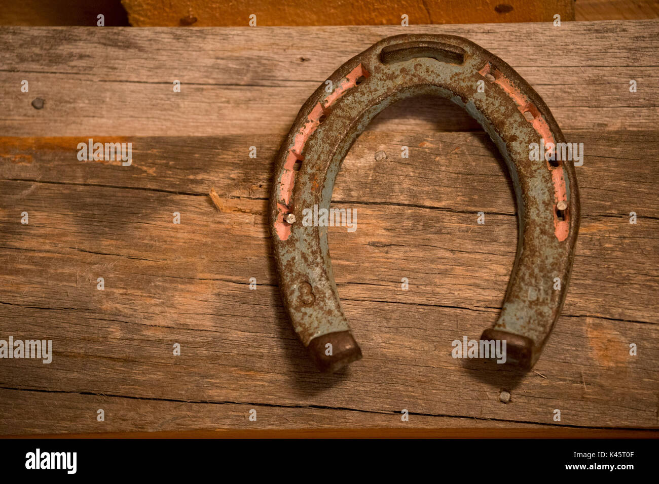 Old and rusty horseshoe on a wall Stock Photo Alamy