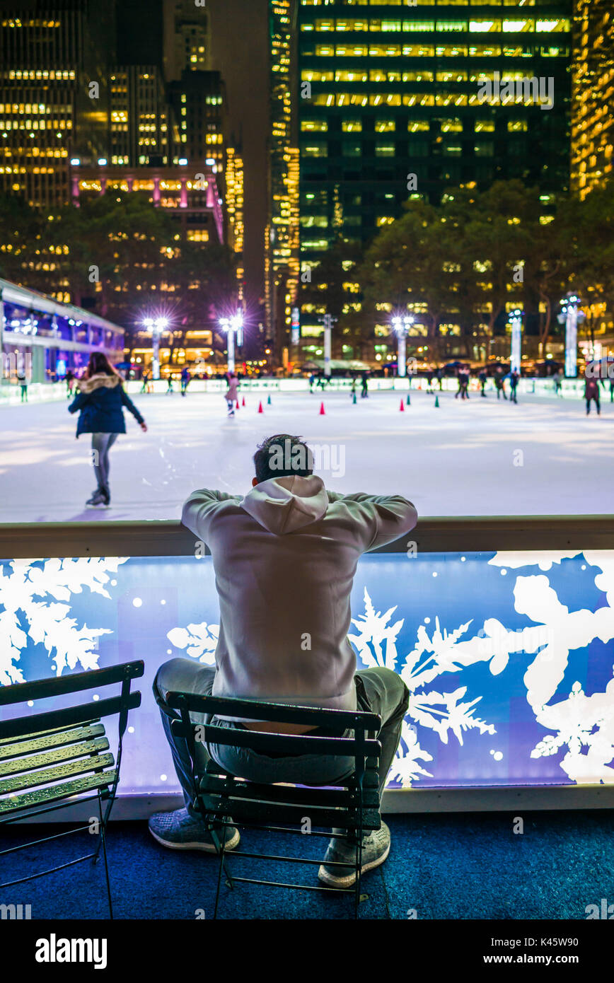USA, New York, New York City, Mid-Town Manhattan, Bryant Park, public skating rink, autumn Stock Photo
