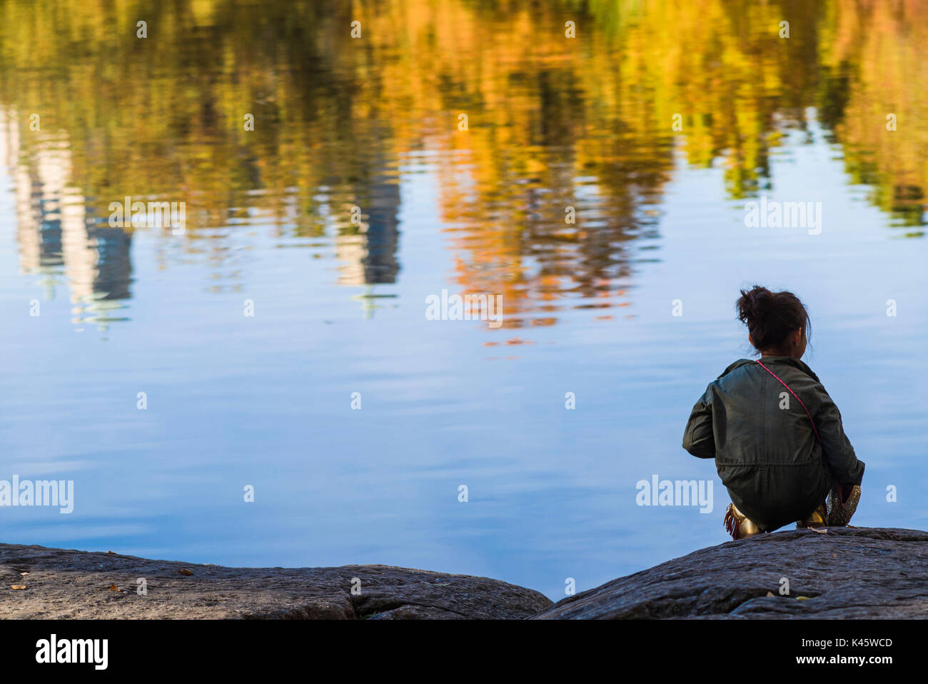 USA, New York, New York City, Central Park, children by The Pond, autumn Stock Photo