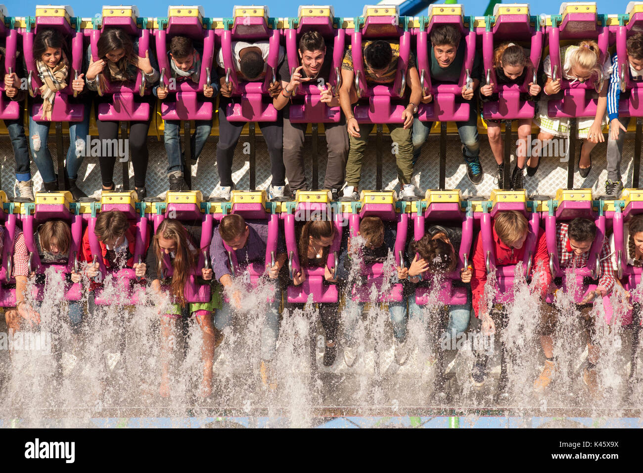 Oktoberfest in Munich is the biggest beer festival of the world with many huge beer tents, carousels, and amusement huts Stock Photo