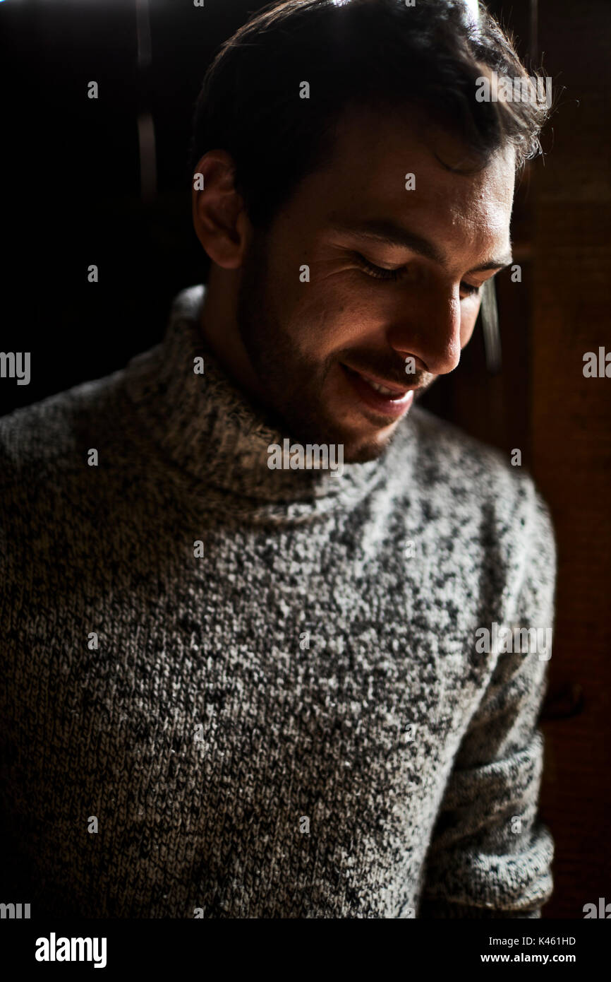 Barn, man with knitted pullover, smile, lowered view, portrait, Stock Photo