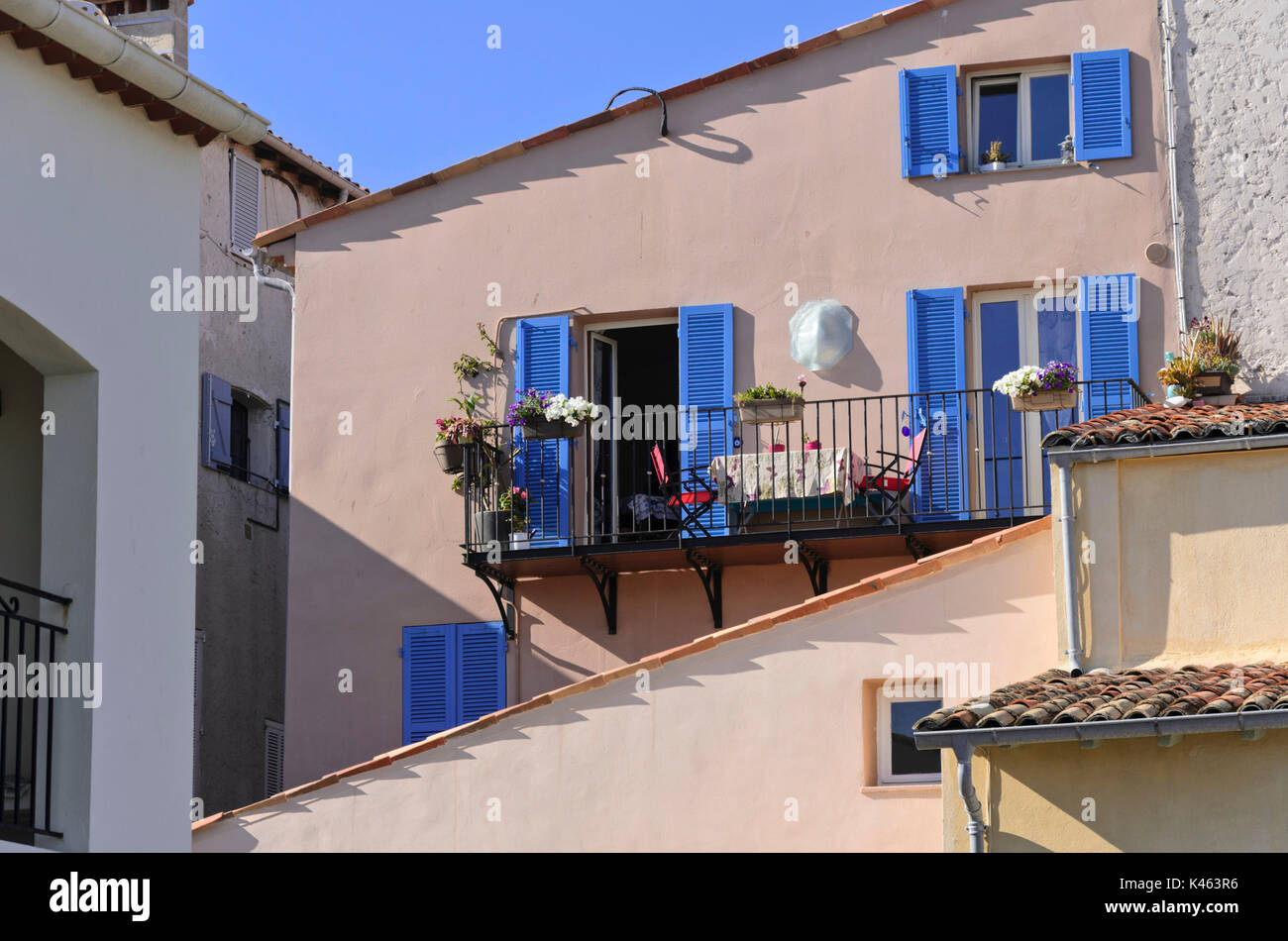 Old town house with blue shutters, Antibes, France Stock Photo