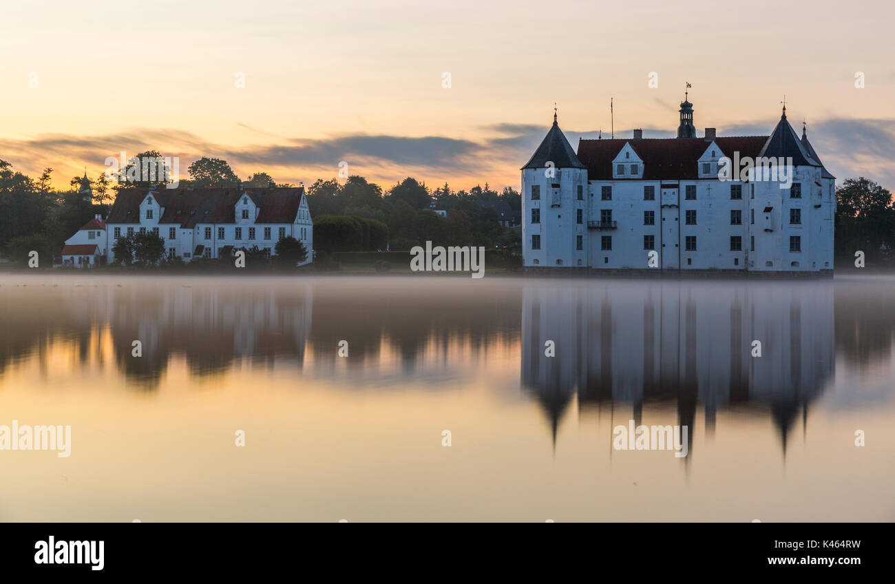 Glucksburg water castle at dawn, Germany Stock Photo