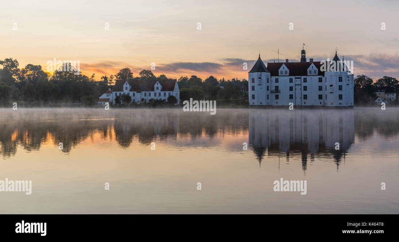 Glucksburg water castle at dawn, Germany Stock Photo