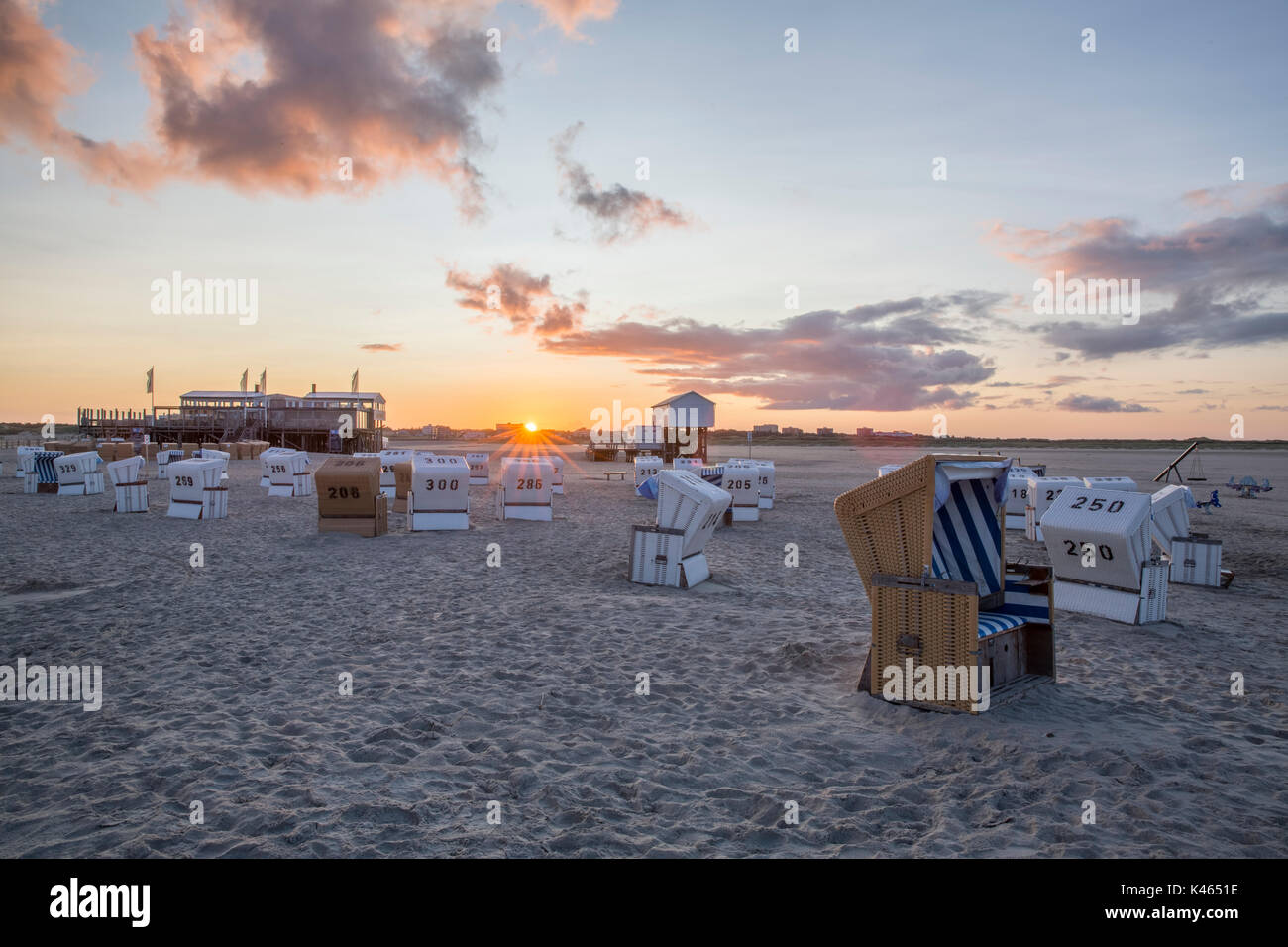 Traditional beach baskets or hooded beach chairs at nothern Germany Stock Photo
