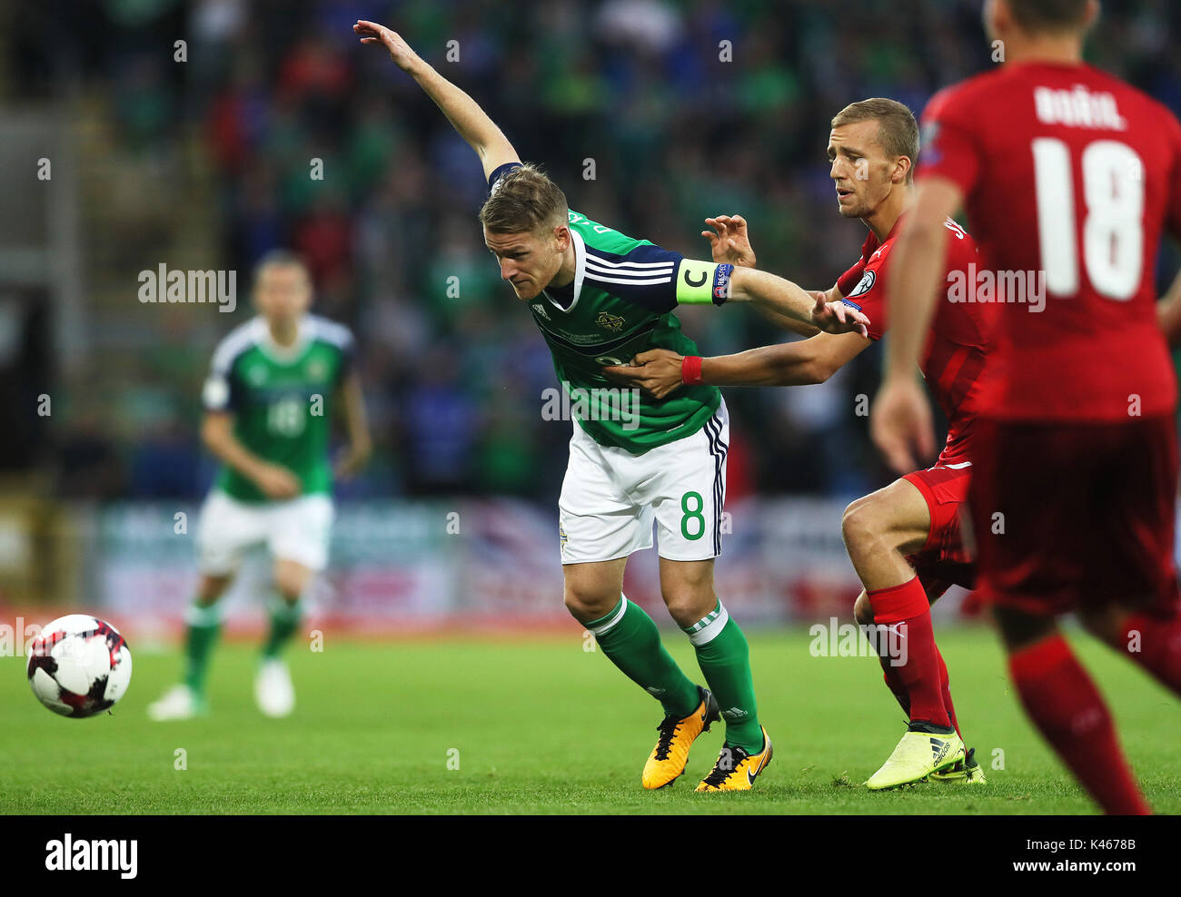Northern Ireland's Steven Davis and Czech Republic's Tomas Soucek battle for the ball during the 2018 FIFA World Cup Qualifying, Group C match at Windsor Park, Belfast. Stock Photo