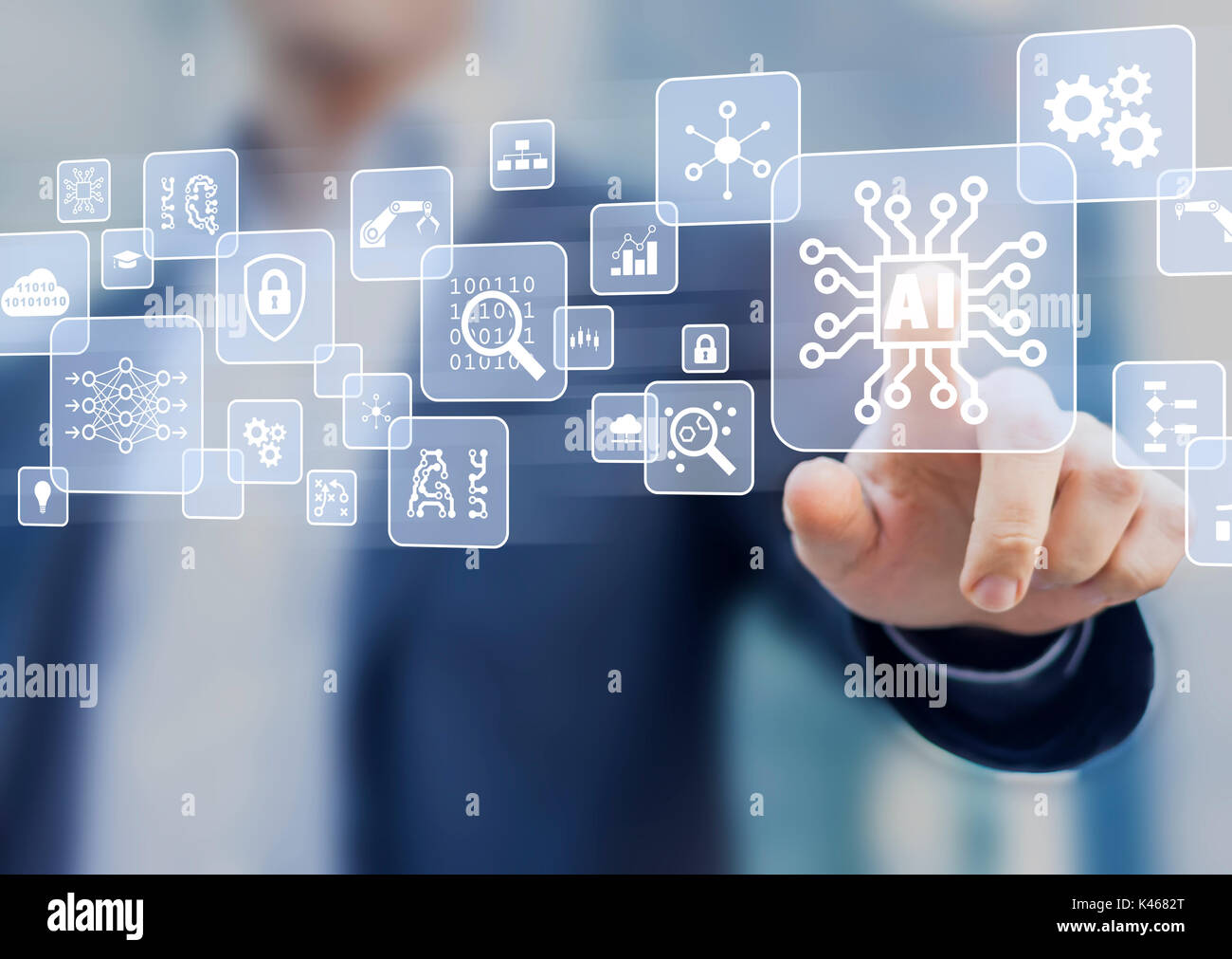 Artificial Intelligence (AI), machine learning and data mining technology icons on a virtual interface with a person touching a button with electronic Stock Photo