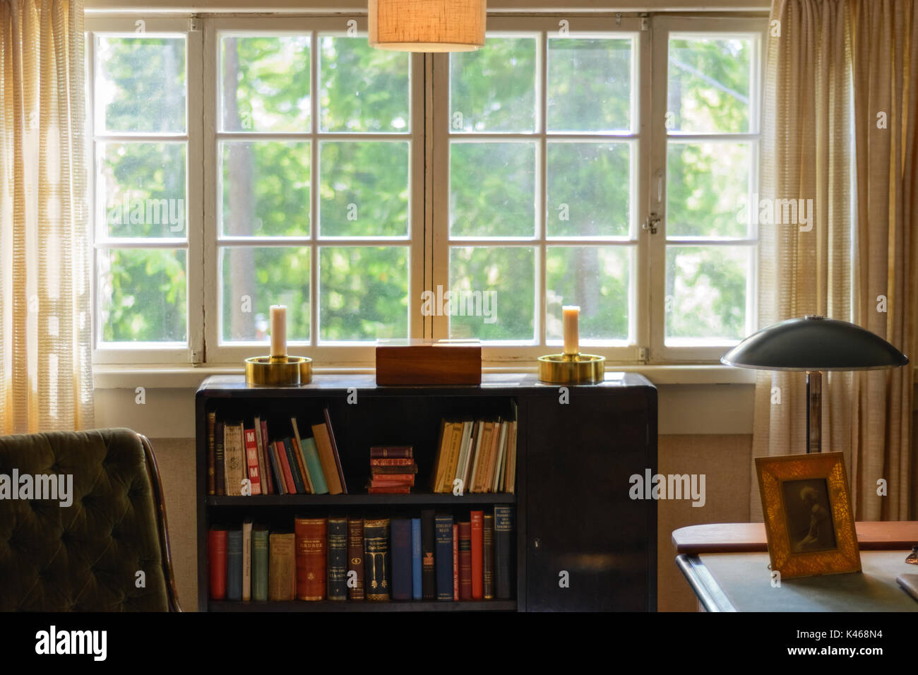 The interior of the study with a window in the house of the famous Finnish musician Sibelius in the town of Ainova in the town of Jarvenpaa. Stock Photo
