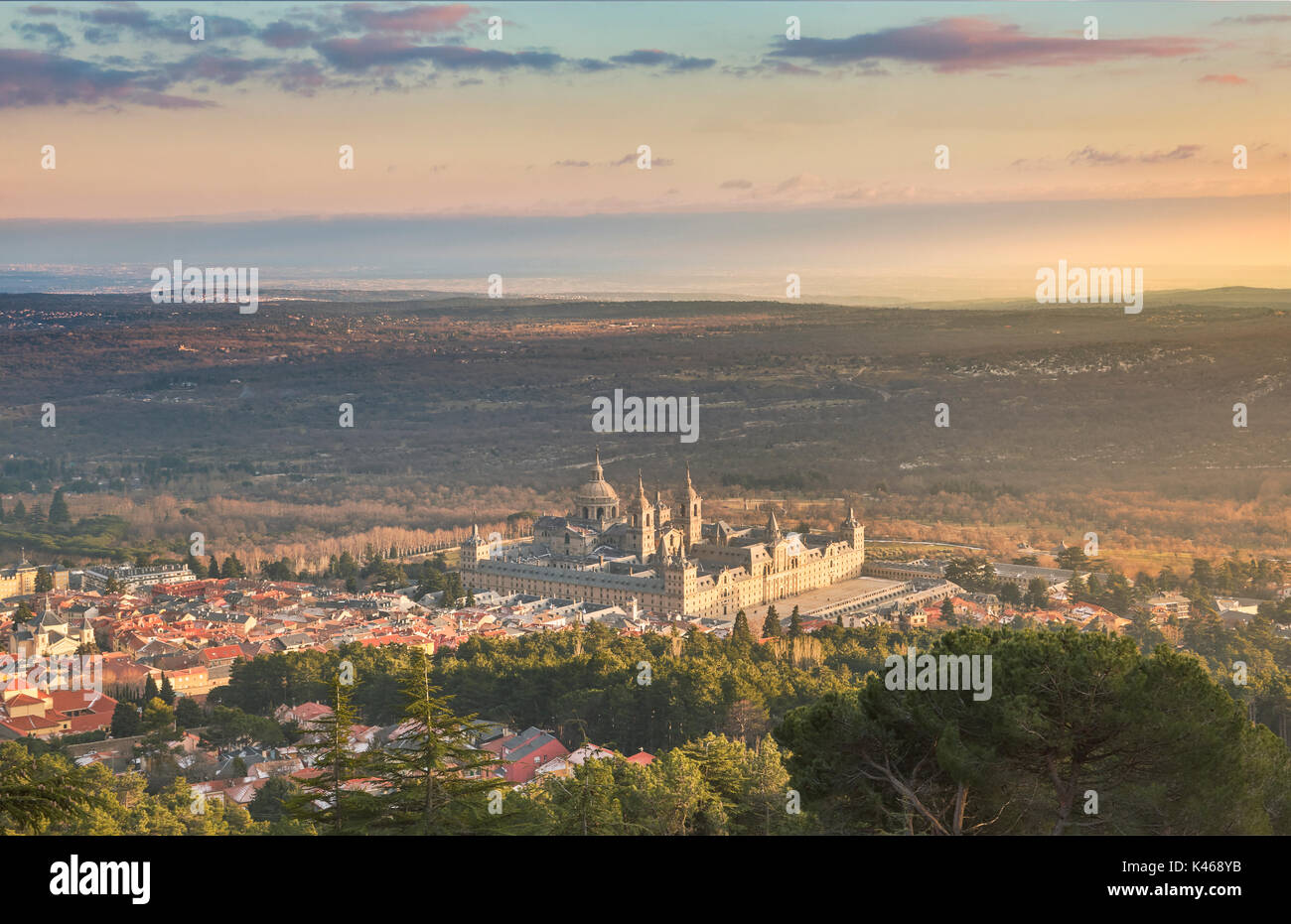 Royal Site of San Lorenzo of El Escorial seen from the Abantos lookout point. Madrid province, Spain. Stock Photo