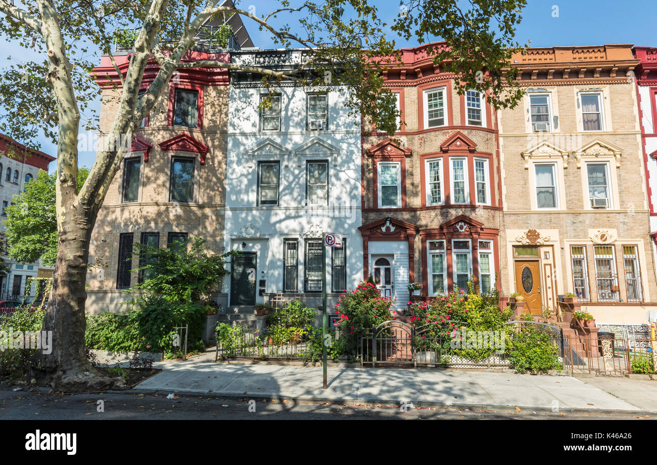 A row of historic brick apartment buildings on St. Francis Place in the Crown Heights Neighborhood of Brooklyn, New York Stock Photo