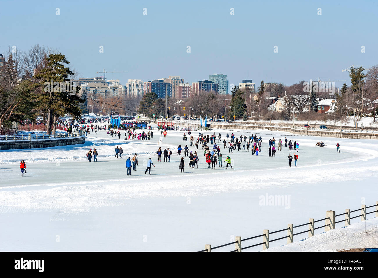 Skaters on frozen canal Stock Photo