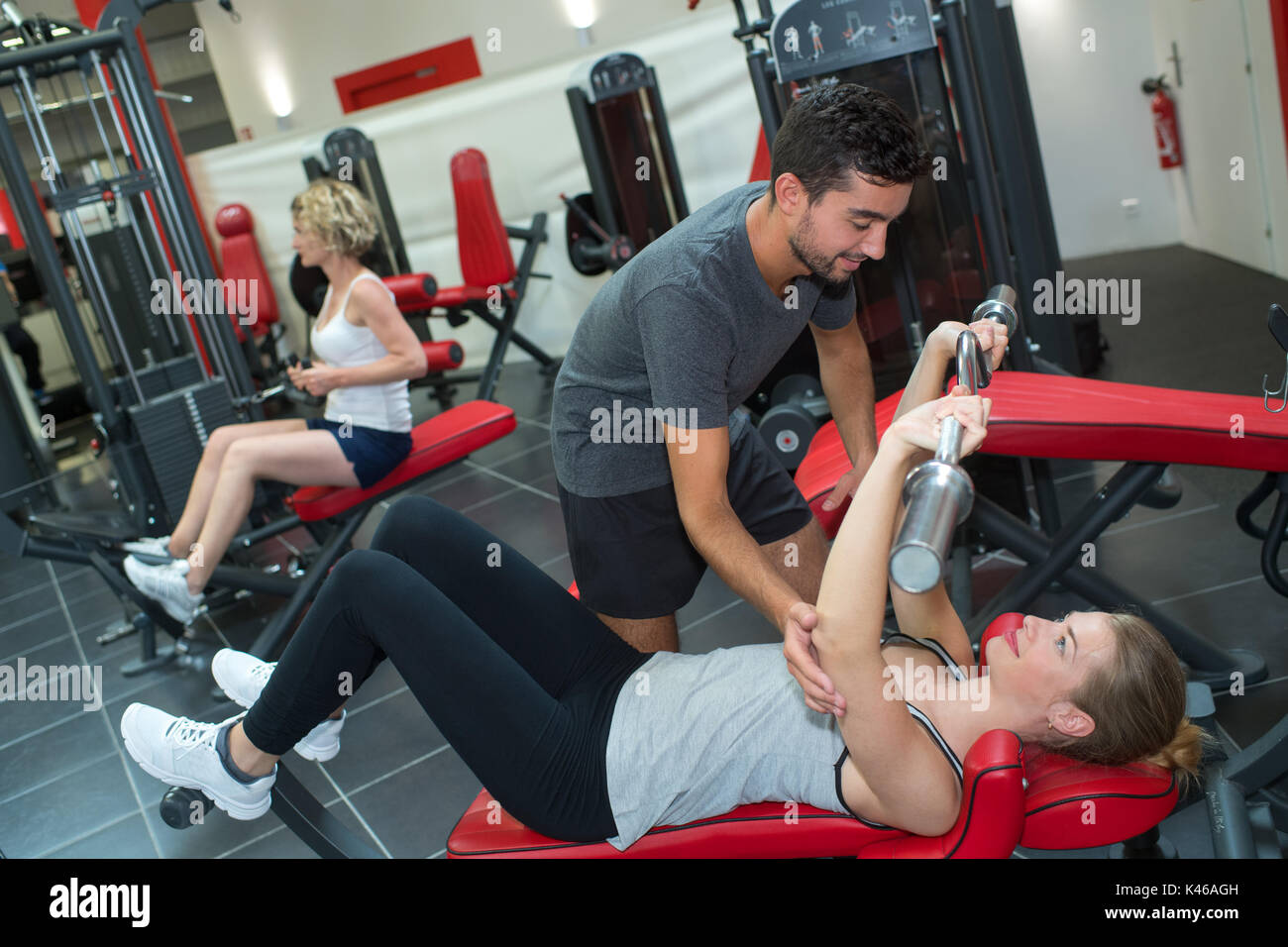 Woman exercising cable machine hi-res stock photography and images - Alamy