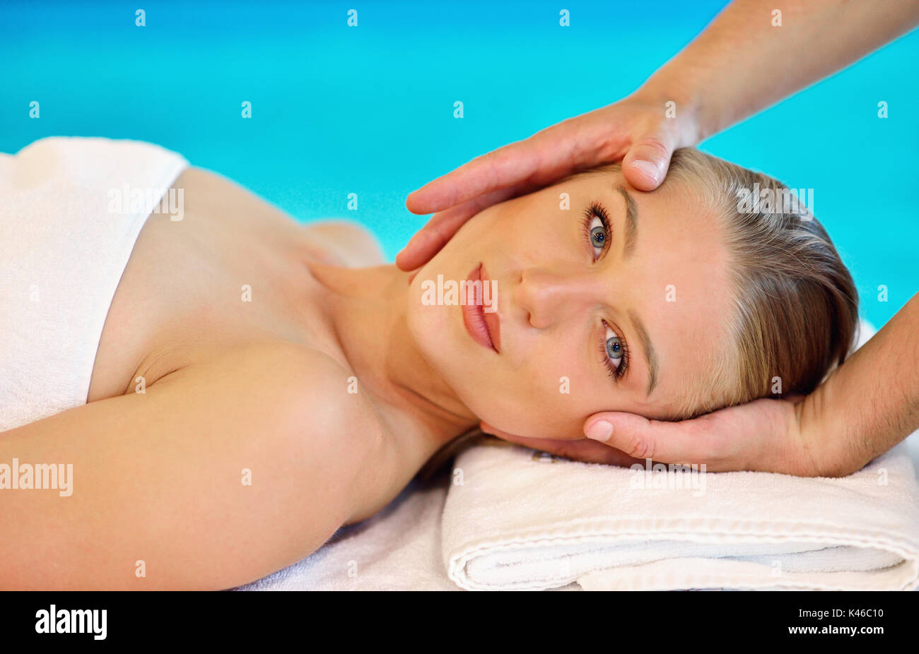 Young Caucasian woman on a head massage. Stock Photo
