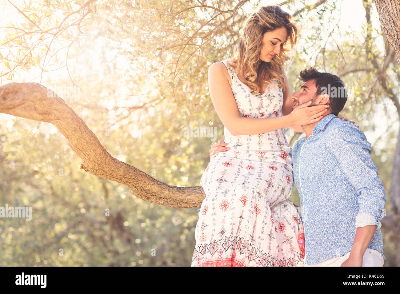 Beautiful couple in love on a walk in autumn forest Stock Photo - Alamy