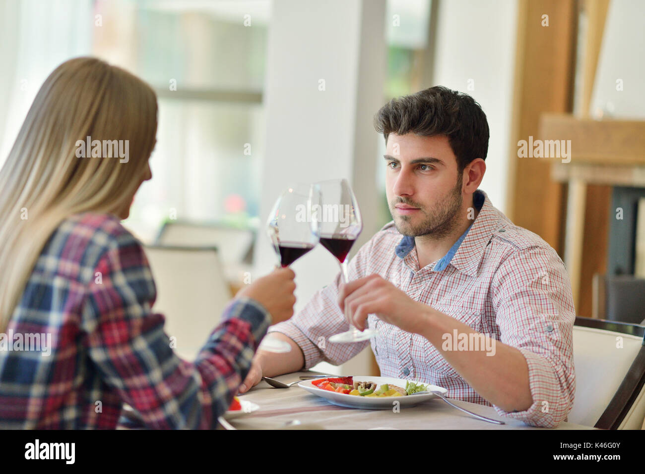 romantic lunch in a fancy restaurant.couple sitting and eating at lunch