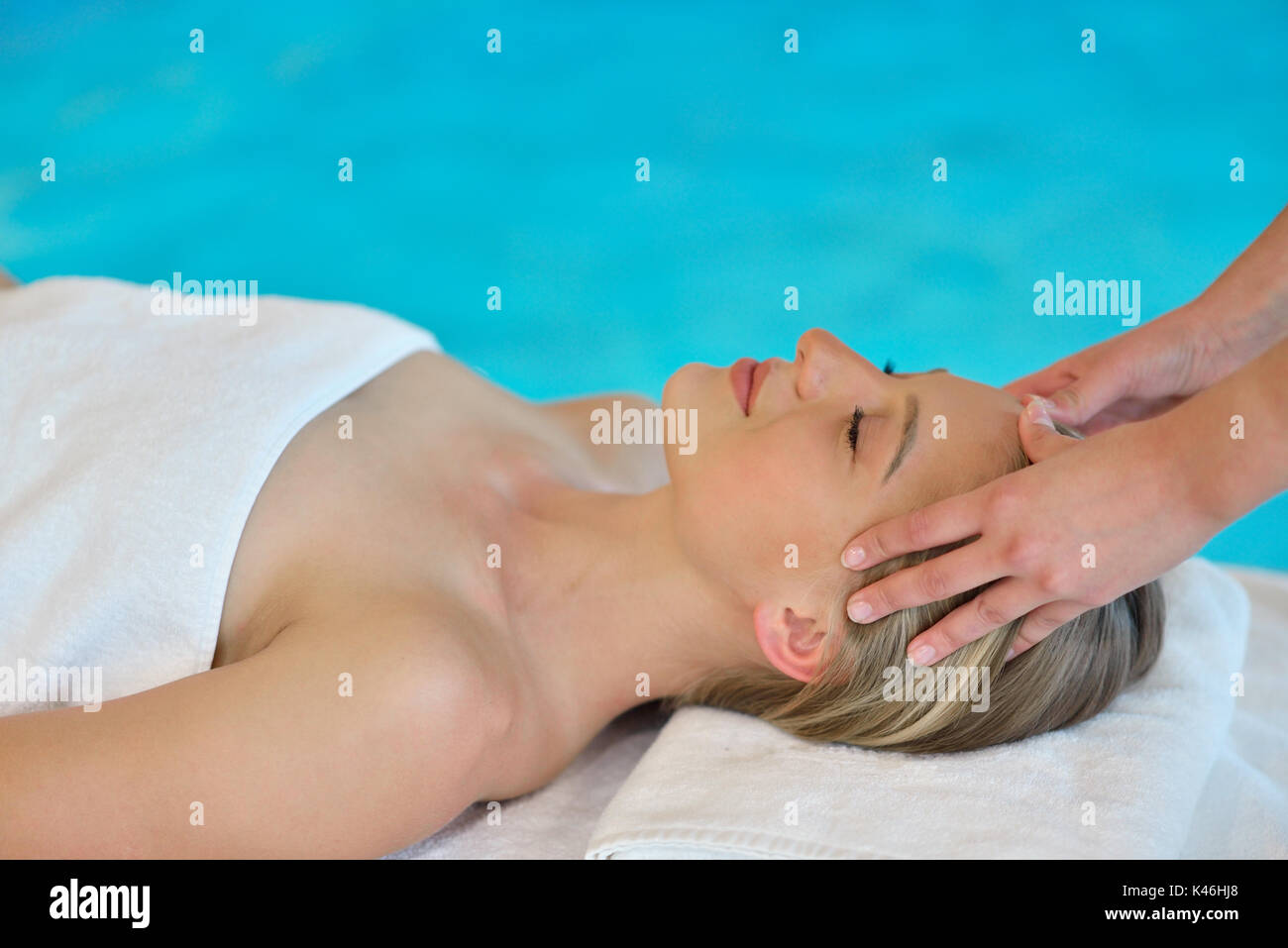 Young Caucasian woman on a head massage. Stock Photo