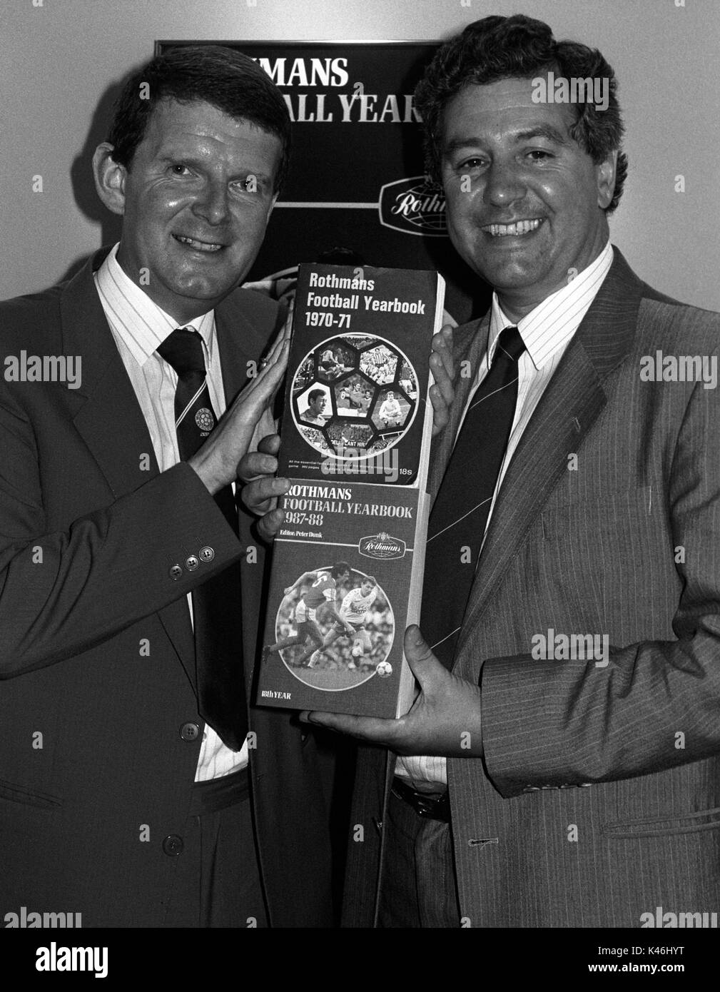 Sports commentator John Motson (l) and Queen's Park Rangers chairman David Hulstrode at the announcement of the Rothman's 1987 Football Yearbook Awards in London. Stock Photo