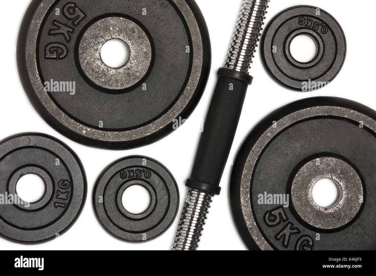 Closeup view of different weight plates for weight training isolated