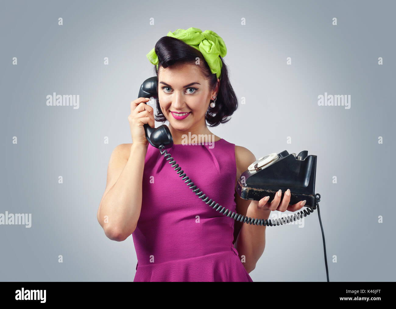 Beautiful Brunette Woman In Pin Up Style With Perfect Hair And