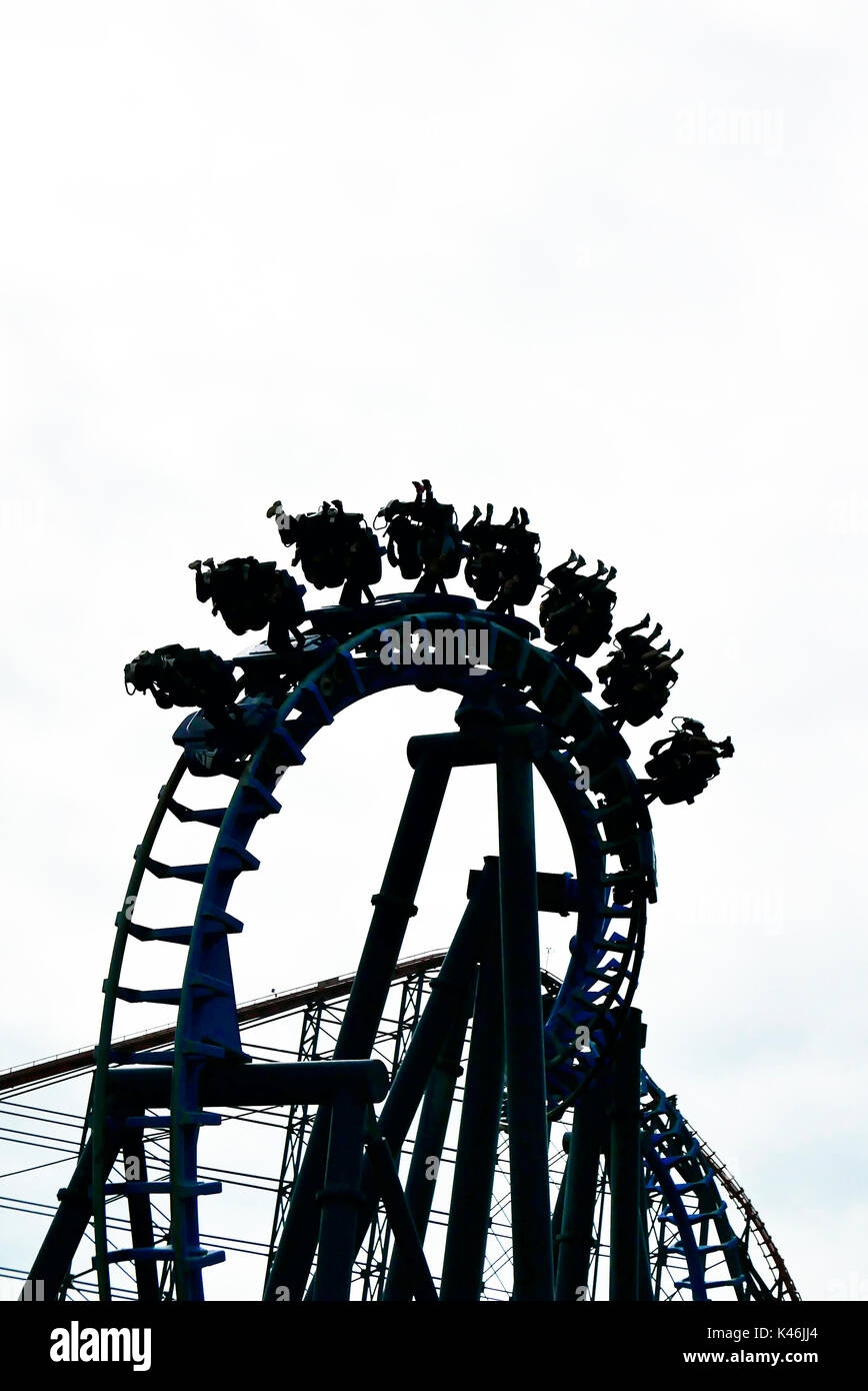 Silhouette of Fusion roller coaster ride on Blackpool Pleasure Beach amusement park Stock Photo