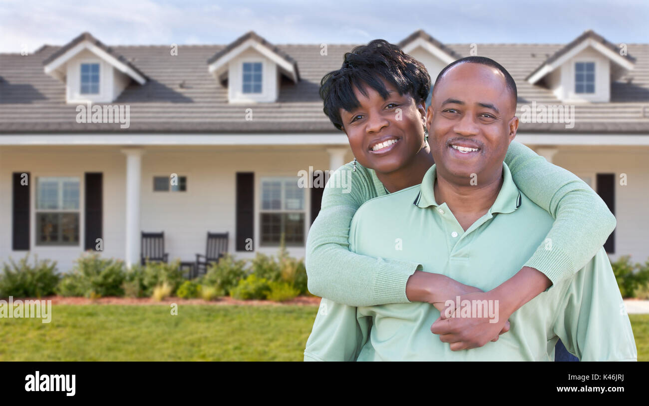 Happy African American Couple In Front of Beautiful House Stock Photo ...