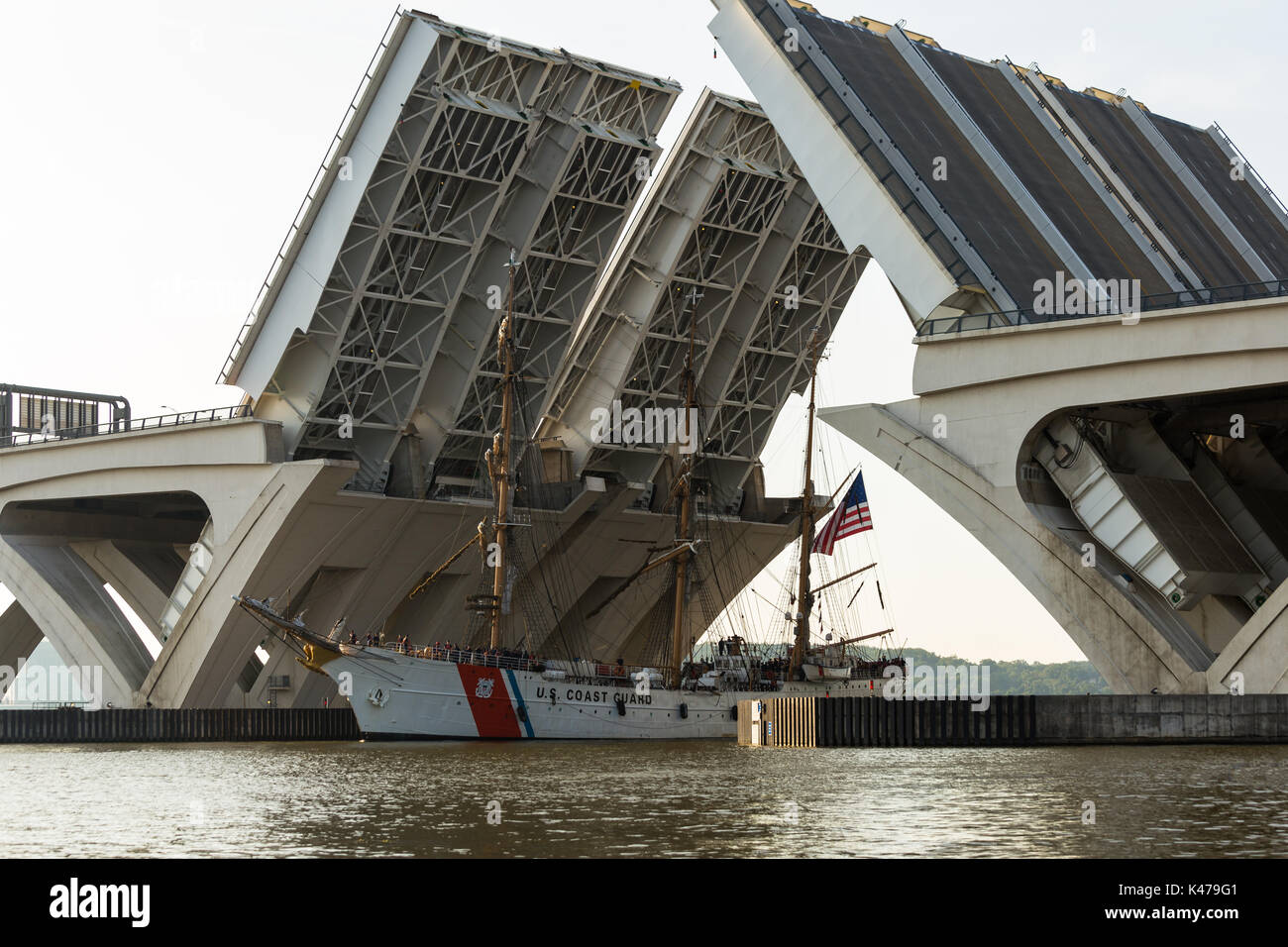 The United States Coast Guard Cutter Eagle passes under an open Woodrow Wilson bridge enroute to