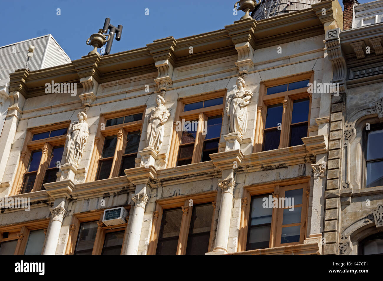 A building dating from 1884 on Broadway between Prince and Spring Streets is decorated with caryatids. Aug. 30, 2017 Stock Photo
