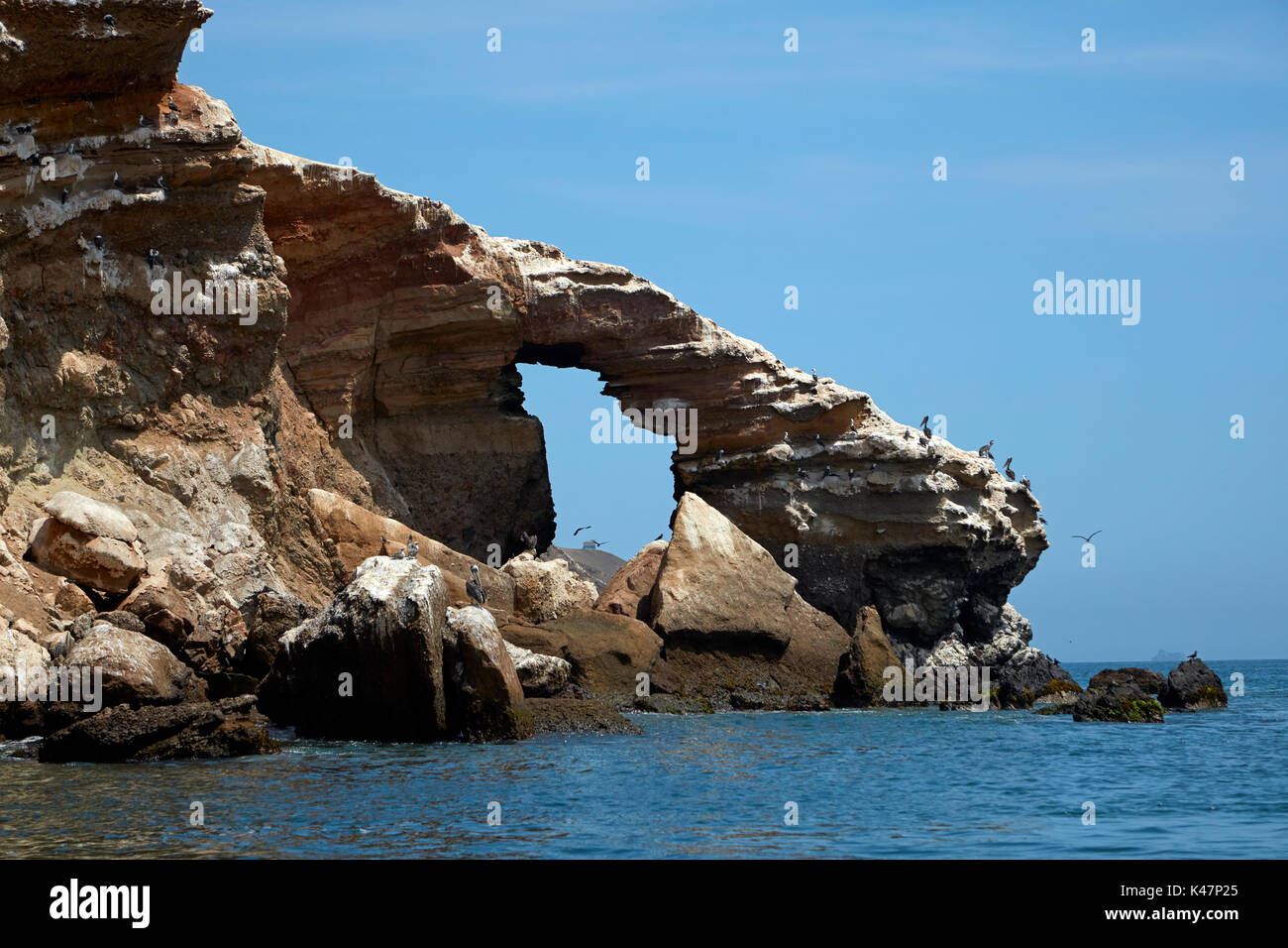 Rock arch and pelicans, Paracas Peninsula, Paracas National Reserve, Pisco Province, Ica Region, Peru, South America Stock Photo