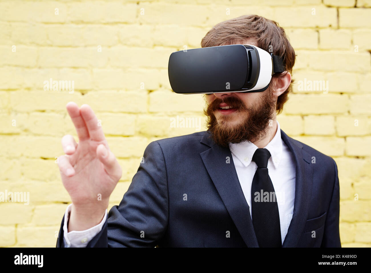 Touching imaginary world Stock Photo