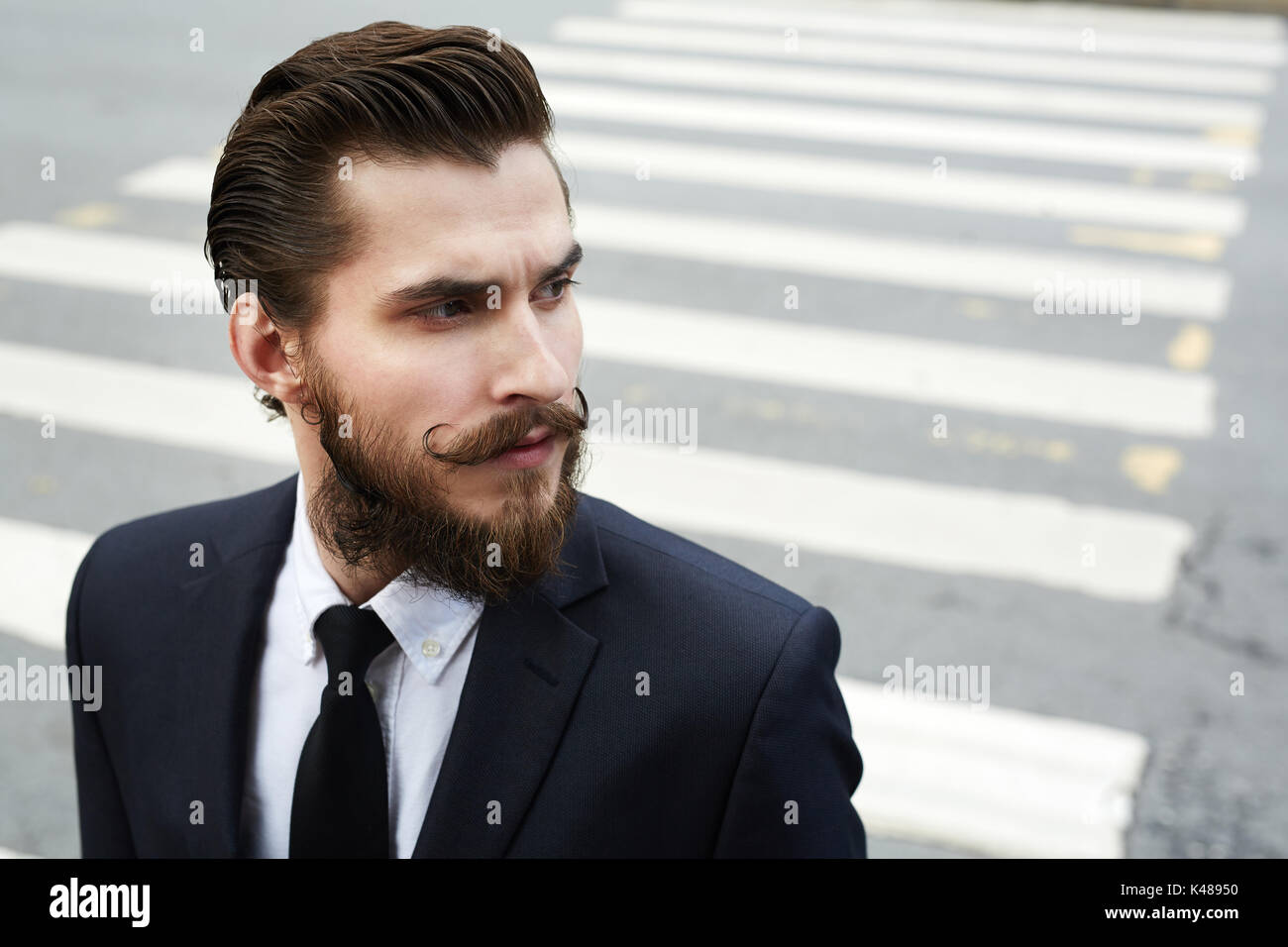 Man on crosswalk Stock Photo