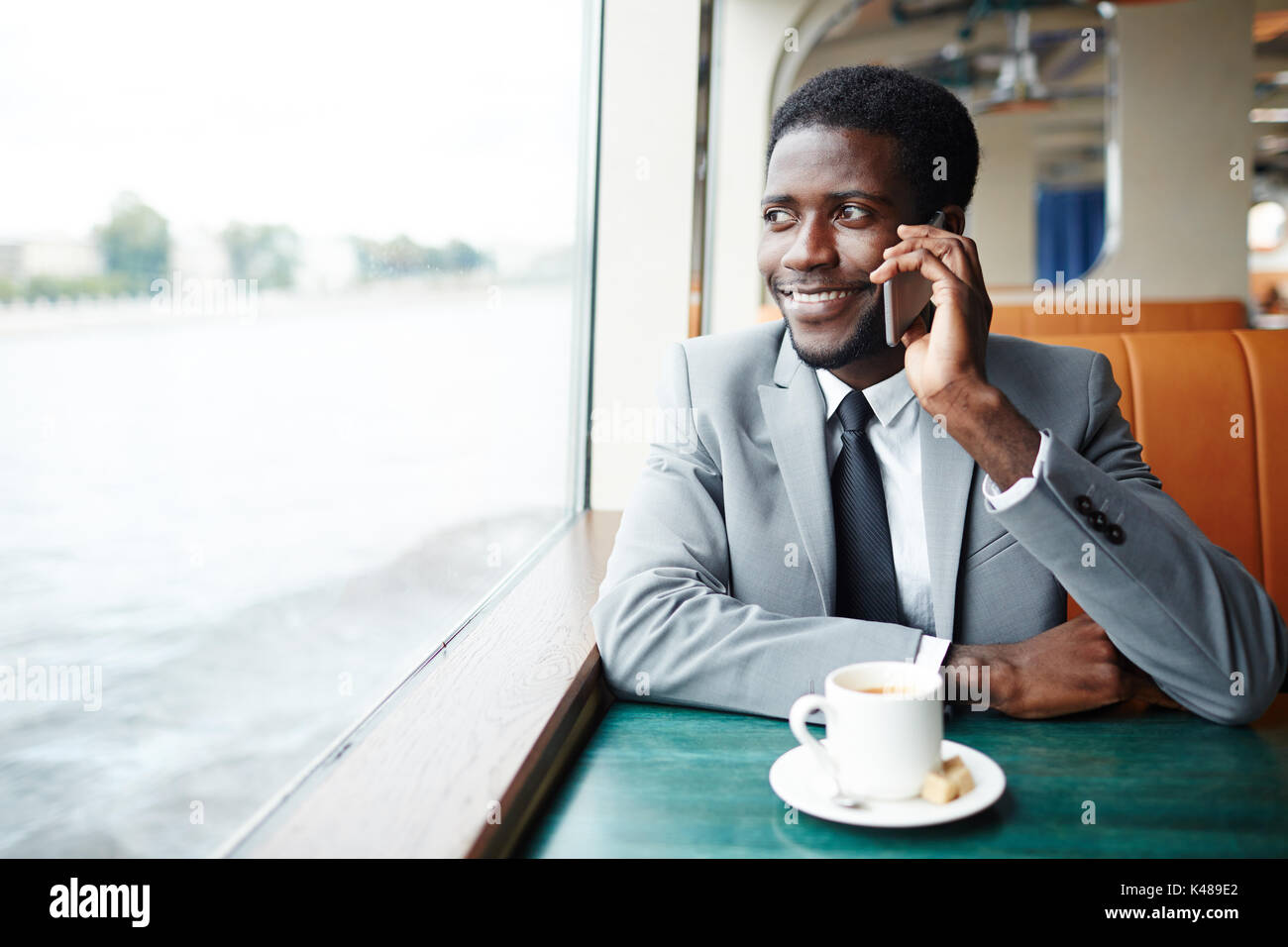 Calling during journey Stock Photo