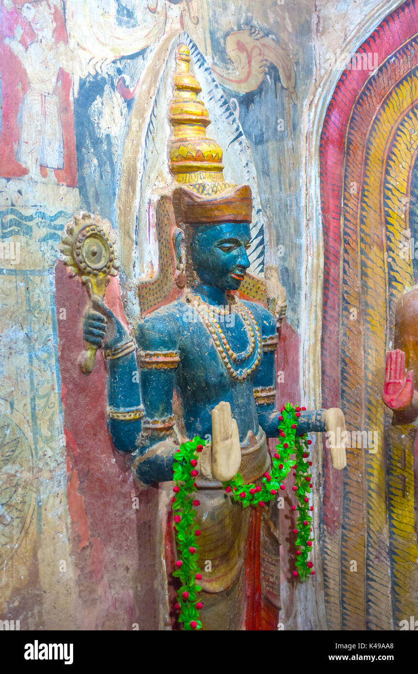 BATTALA, SRI LANKA - DECEMBER 2, 2016: The old statue of Vishnu in wall of historic Yudaganawa temple, on December 2 in Battala Stock Photo